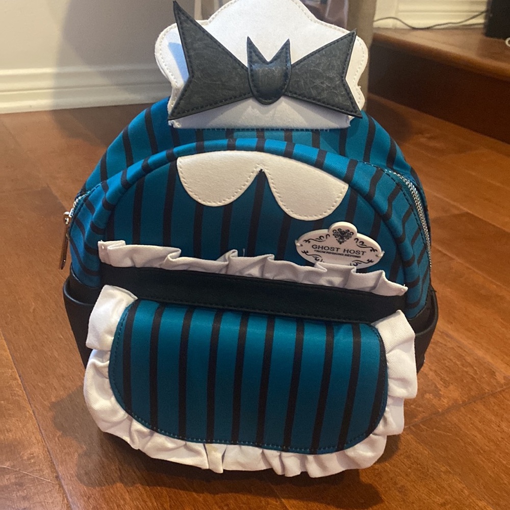 Haunted -mansion-ghost-host-mini-backpack-by-Loungefly. Only used twice.